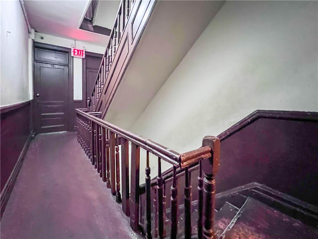 5907 4th Avenue Brooklyn, NY 11220 - Photo 13 of 37 a view of a hallway with staircase