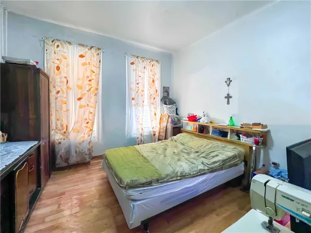 a kitchen with a refrigerator and a stove