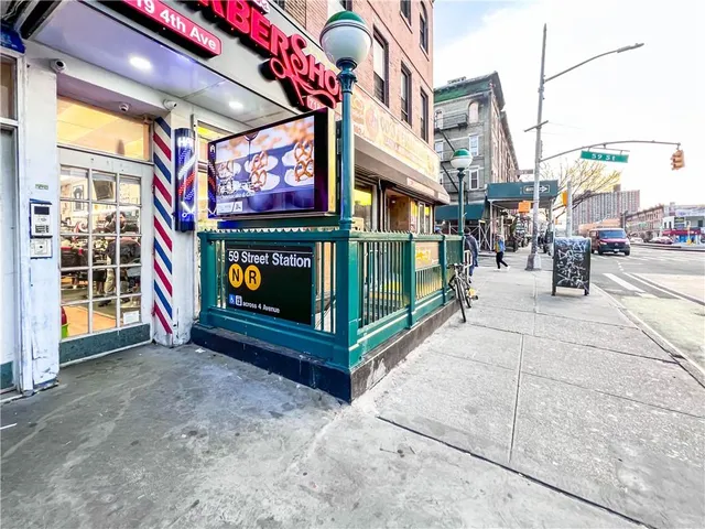 a view of a building with sitting area