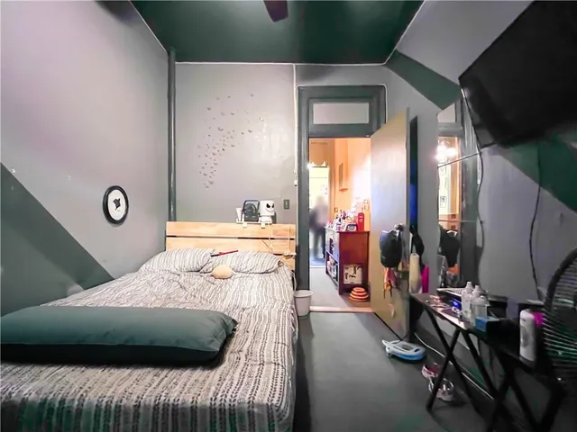 a bathroom with a sink a toilet a shower and a mirror