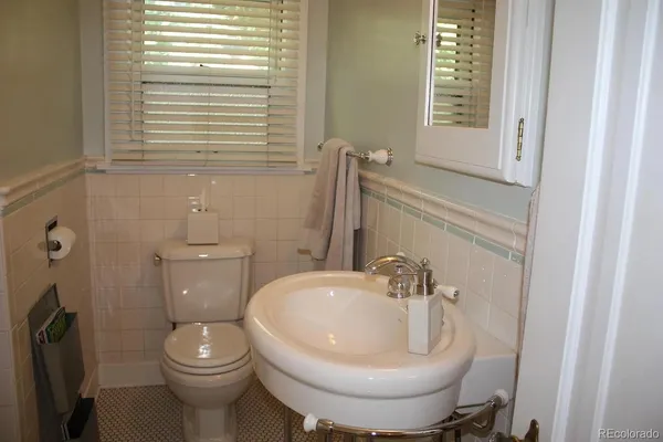 a bathroom with a sink and a toilet