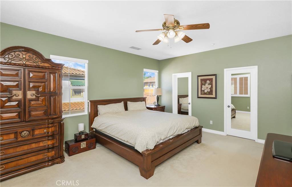 51 Olivehurst Irvine, CA 92602 - Photo 14 of 45 a bed sitting in a spacious bedroom next to a window