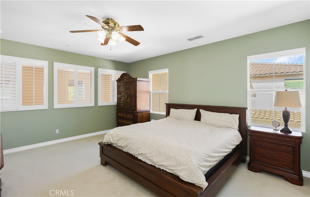 51 Olivehurst Irvine, CA 92602 - Photo 15 of 45 a bedroom with a bed and window