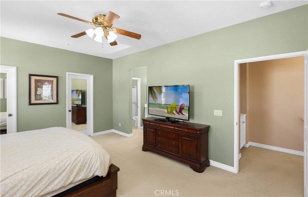 51 Olivehurst Irvine, CA 92602 - Photo 17 of 45 a bedroom with a bed and a flat screen tv