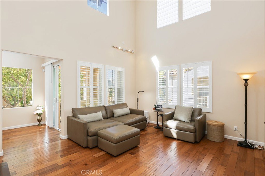 51 Olivehurst Irvine, CA 92602 - Photo 2 of 45 a living room with furniture and a large window