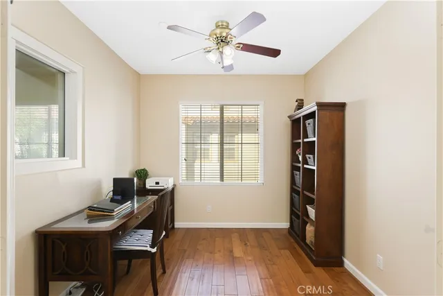 a workspace with furniture and a window