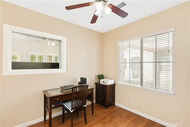 a workspace with furniture and a window