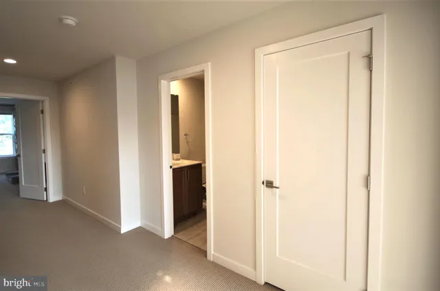 an entryway with a glass door