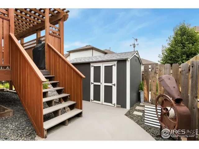 a view of outdoor space with deck and furniture