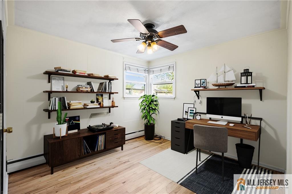 67 Drake Place Colonia, NJ 07067 - Photo 10 of 31 a view of a workspace with furniture and a window