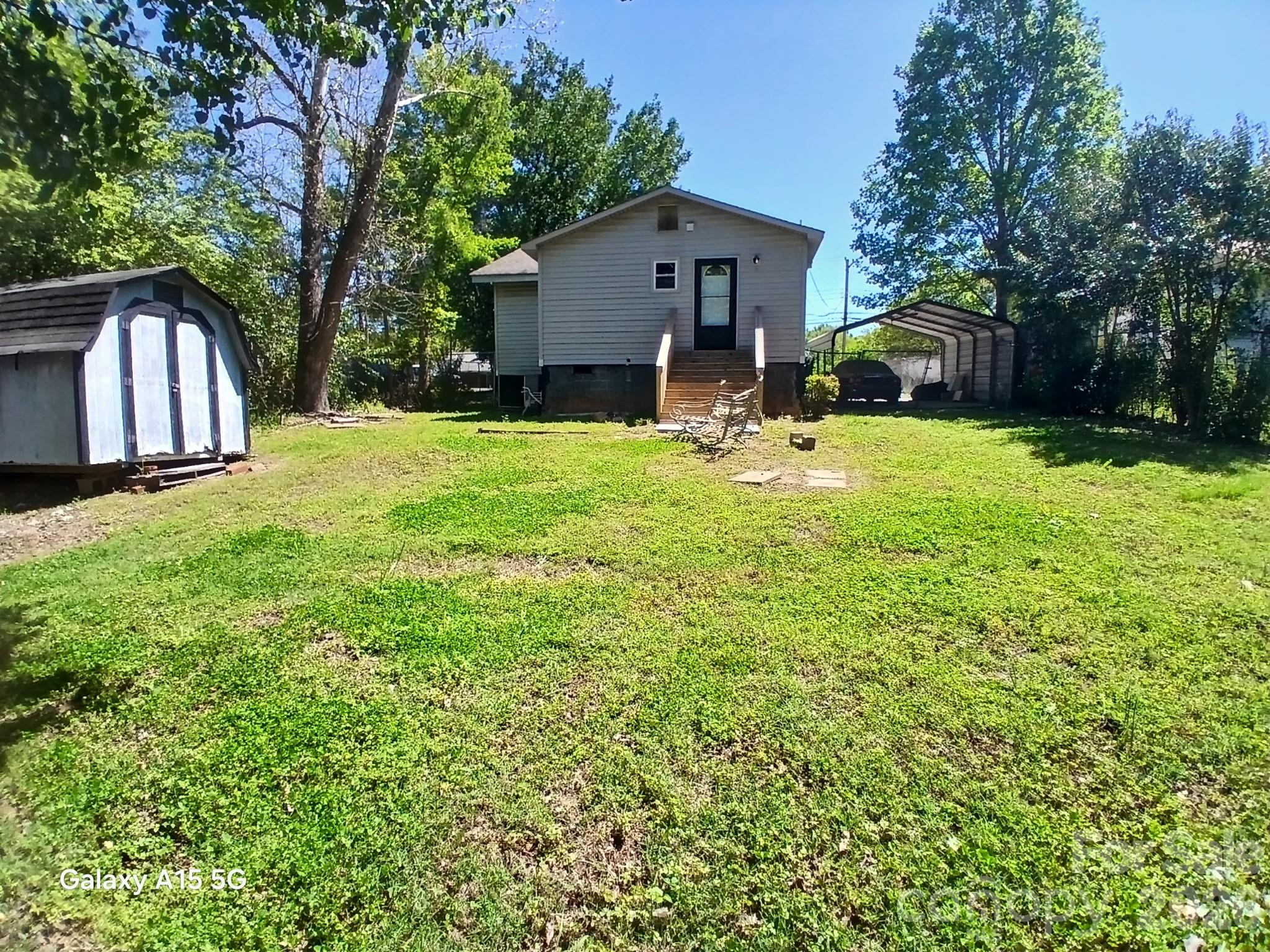 634 Oates Road Gastonia, NC 28052 - Photo 29 of 33 a front view of a house with yard and green space