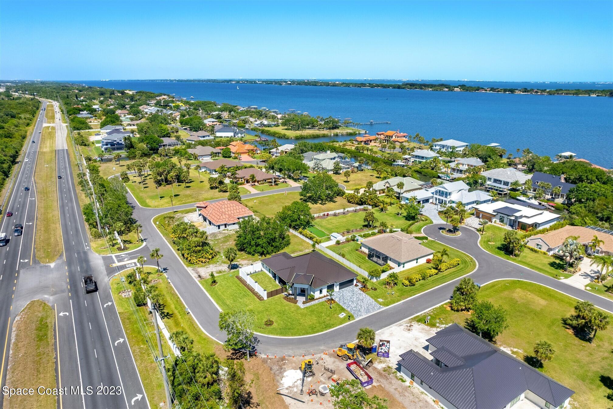 0 Bosun Rockledge, FL 32955 - Photo 3 of 10 an aerial view of residential houses with outdoor space and swimming pool