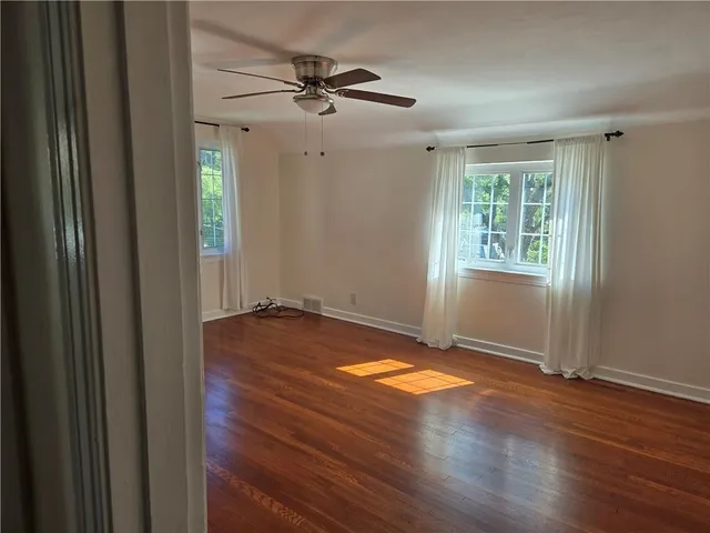 a bathroom with a shower and a sink