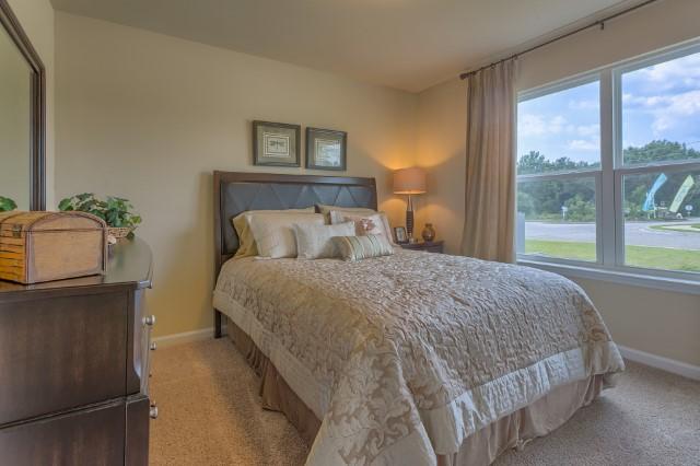 2806 Patriot Ridge Crestview, FL 32539 - Photo 8 of 18 a bedroom with a bed and window