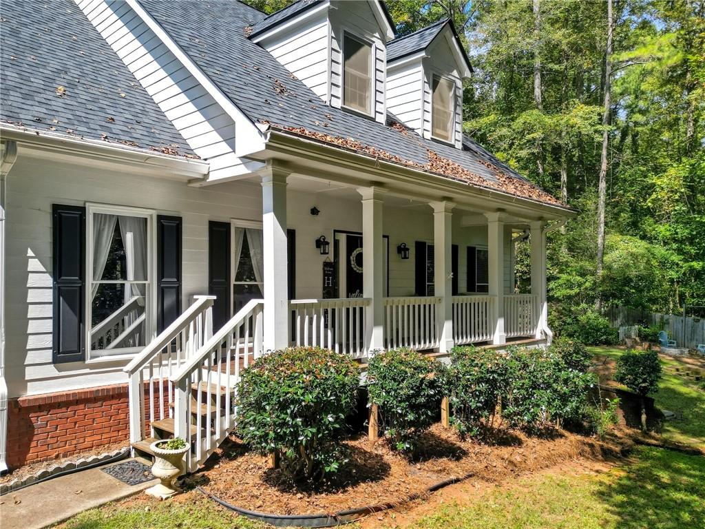 5090 Eubanks Road Woodstock, GA 30188 - Photo 2 of 54 front view of a house