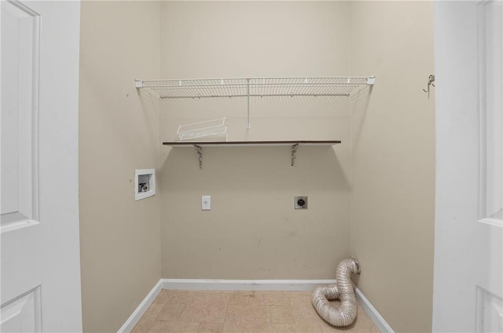 5090 Eubanks Road Woodstock, GA 30188 - Photo 23 of 54 a bathroom with a shower