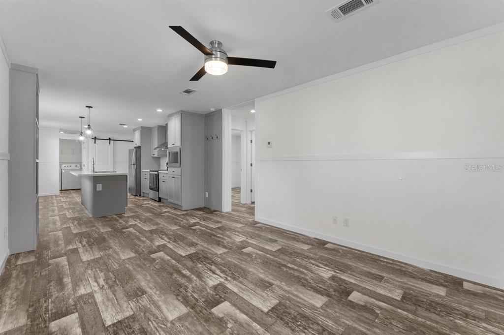 811 North Swindell Avenue, Unit 2 Lakeland, FL 33815 - Photo 14 of 33 a view of a livingroom with a kitchen