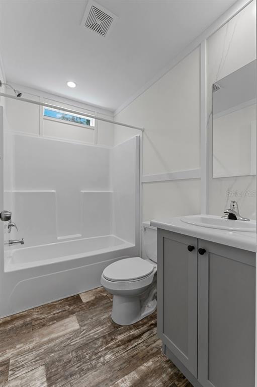 811 North Swindell Avenue, Unit 2 Lakeland, FL 33815 - Photo 32 of 33 a bathroom with a sink toilet and shower