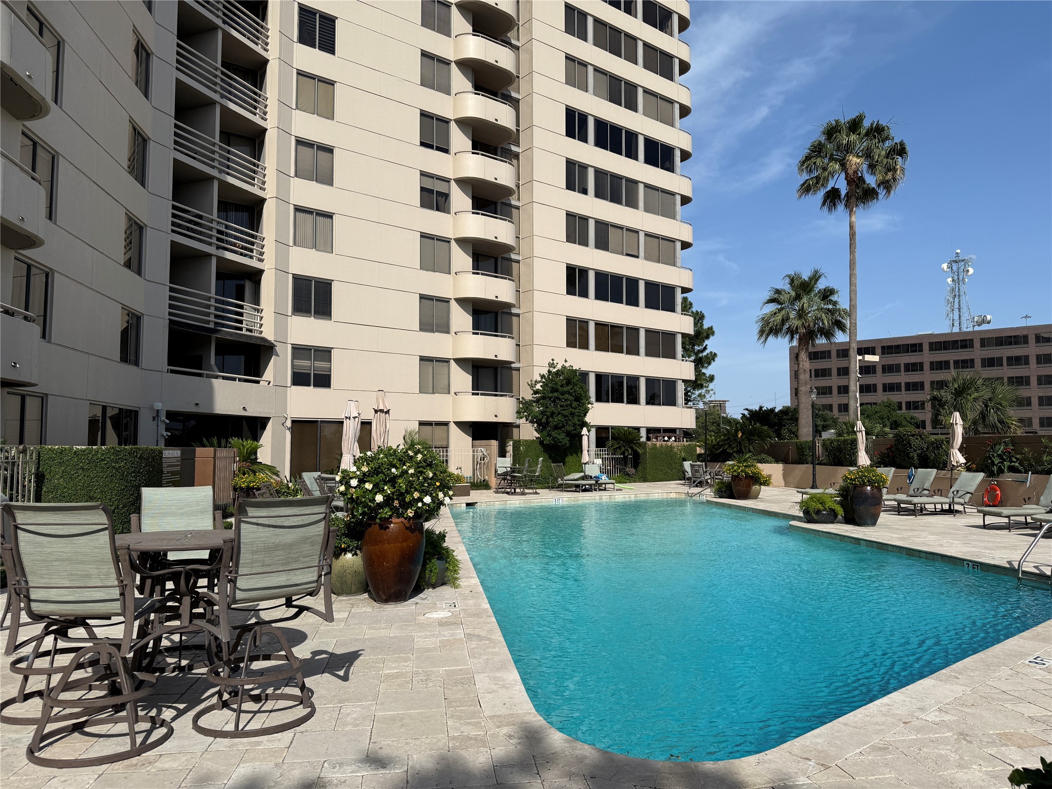 3525 Sage Road, Unit 304 Houston, TX 77056 - Photo 13 of 17 Large outdoor pool to enjoy the hot summer weather.