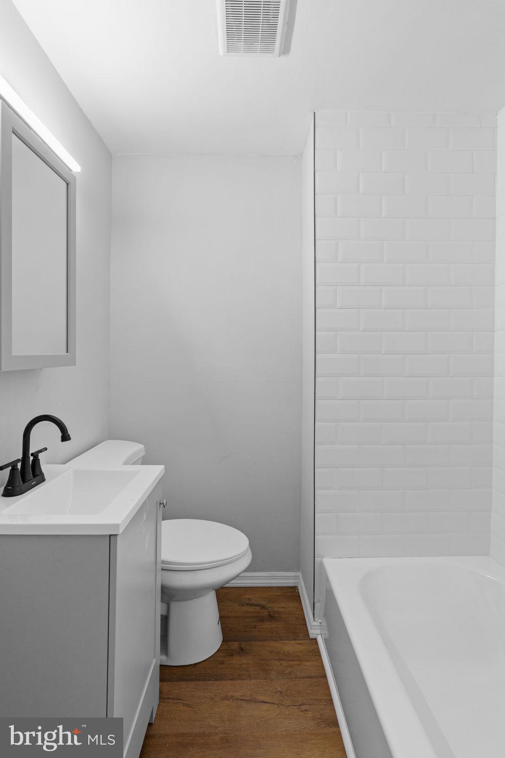 1020 Potter Street Chester, PA 19013 - Photo 15 of 26 a bathroom with a sink a toilet and shower