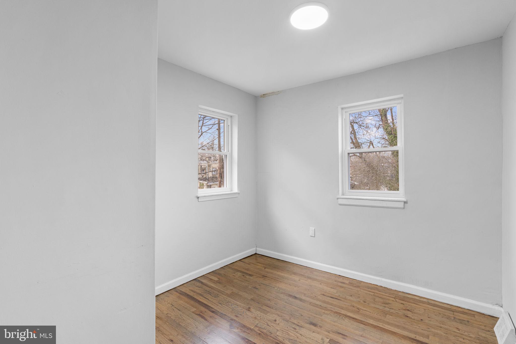 1020 Potter Street Chester, PA 19013 - Photo 17 of 26 an empty room with a window