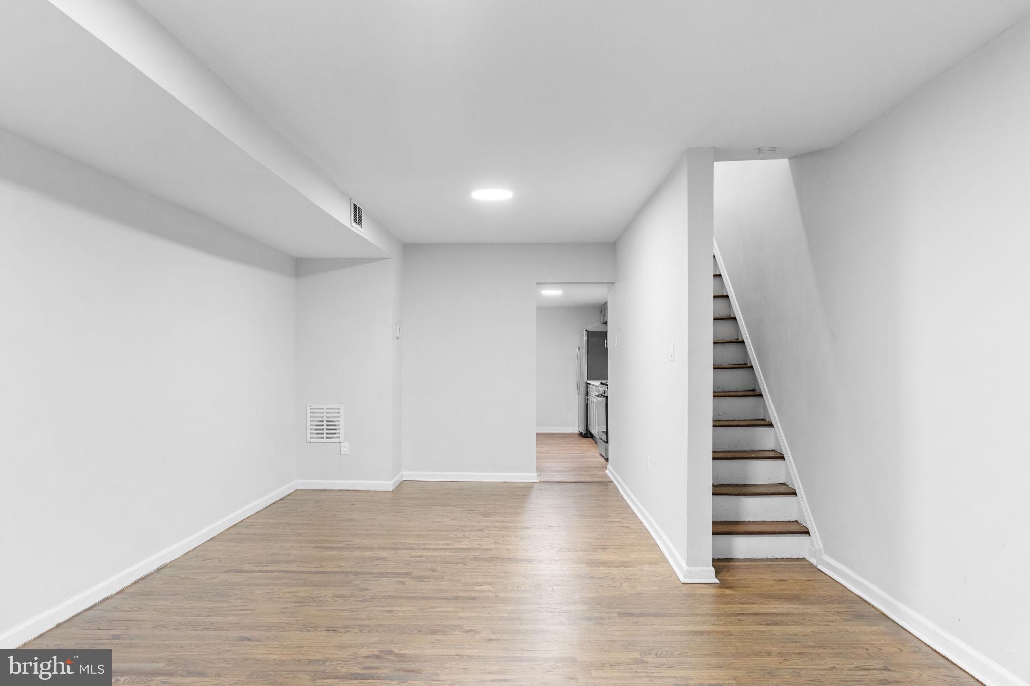 1020 Potter Street Chester, PA 19013 - Photo 3 of 26 a view of entryway with wooden floor