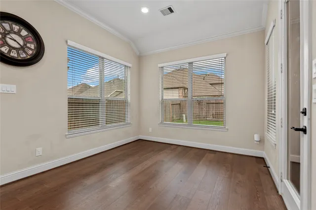 a bathroom with a granite countertop sink vanity and a mirror