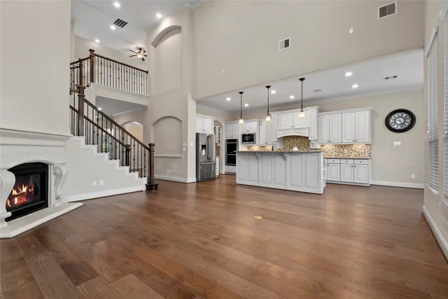 a view of a brick house with a large window