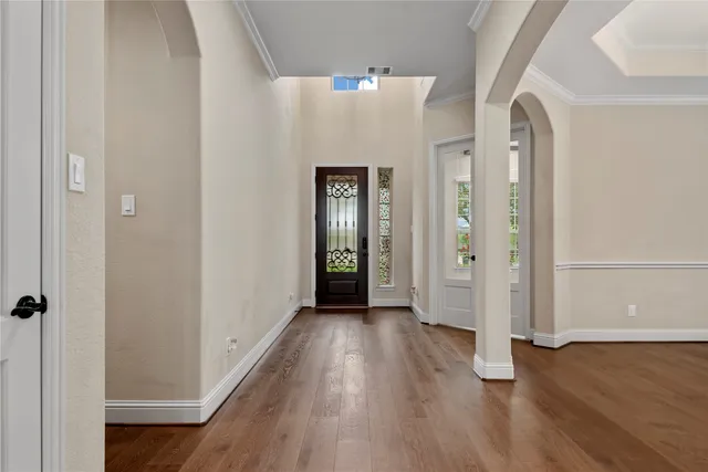 a kitchen with granite countertop a sink and cabinets