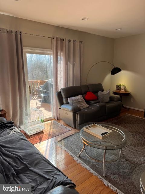 6357 Regal Oak Drive Springfield, VA 22152 - Photo 13 of 42 a living room with furniture and a floor to ceiling window