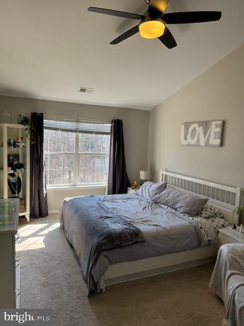 6357 Regal Oak Drive Springfield, VA 22152 - Photo 28 of 42 a bedroom with a bed lamp and window