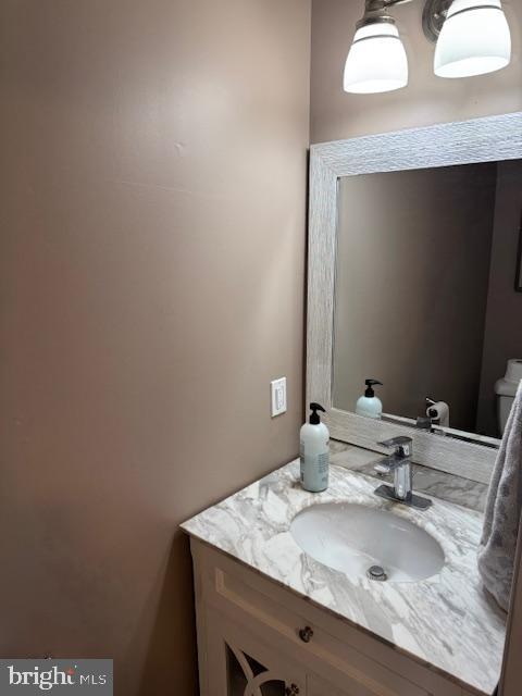 6357 Regal Oak Drive Springfield, VA 22152 - Photo 32 of 42 a bathroom with a sink and a mirror
