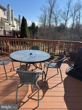 a view of a chairs and table on the terrace