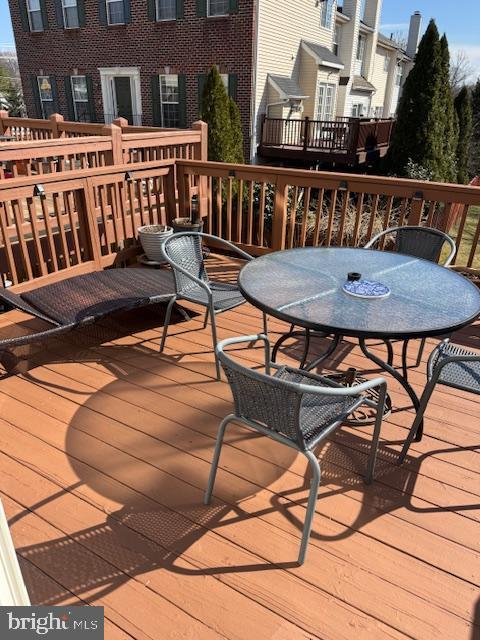 6357 Regal Oak Drive Springfield, VA 22152 - Photo 39 of 42 a view of a chairs and table on the terrace