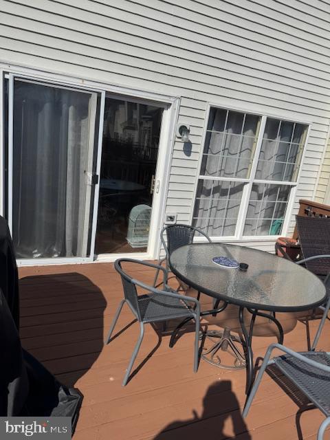 6357 Regal Oak Drive Springfield, VA 22152 - Photo 41 of 42 a balcony with table and chairs