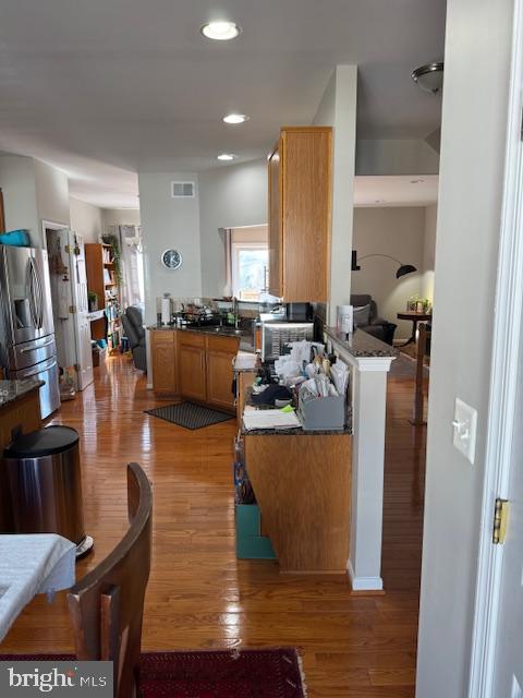 6357 Regal Oak Drive Springfield, VA 22152 - Photo 7 of 42 a living room with fireplace furniture and a flat screen tv