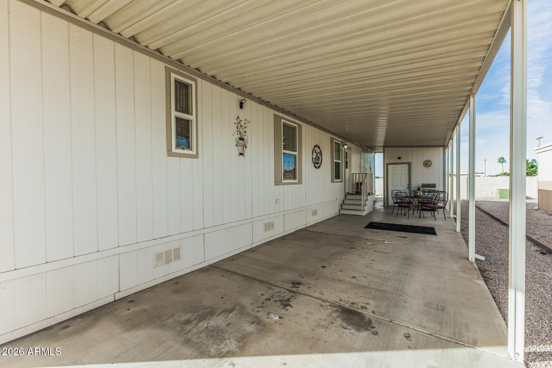9302 East Broadway Road, Unit 186 Mesa, AZ 85208 - Photo 12 of 40 a view of a porch
