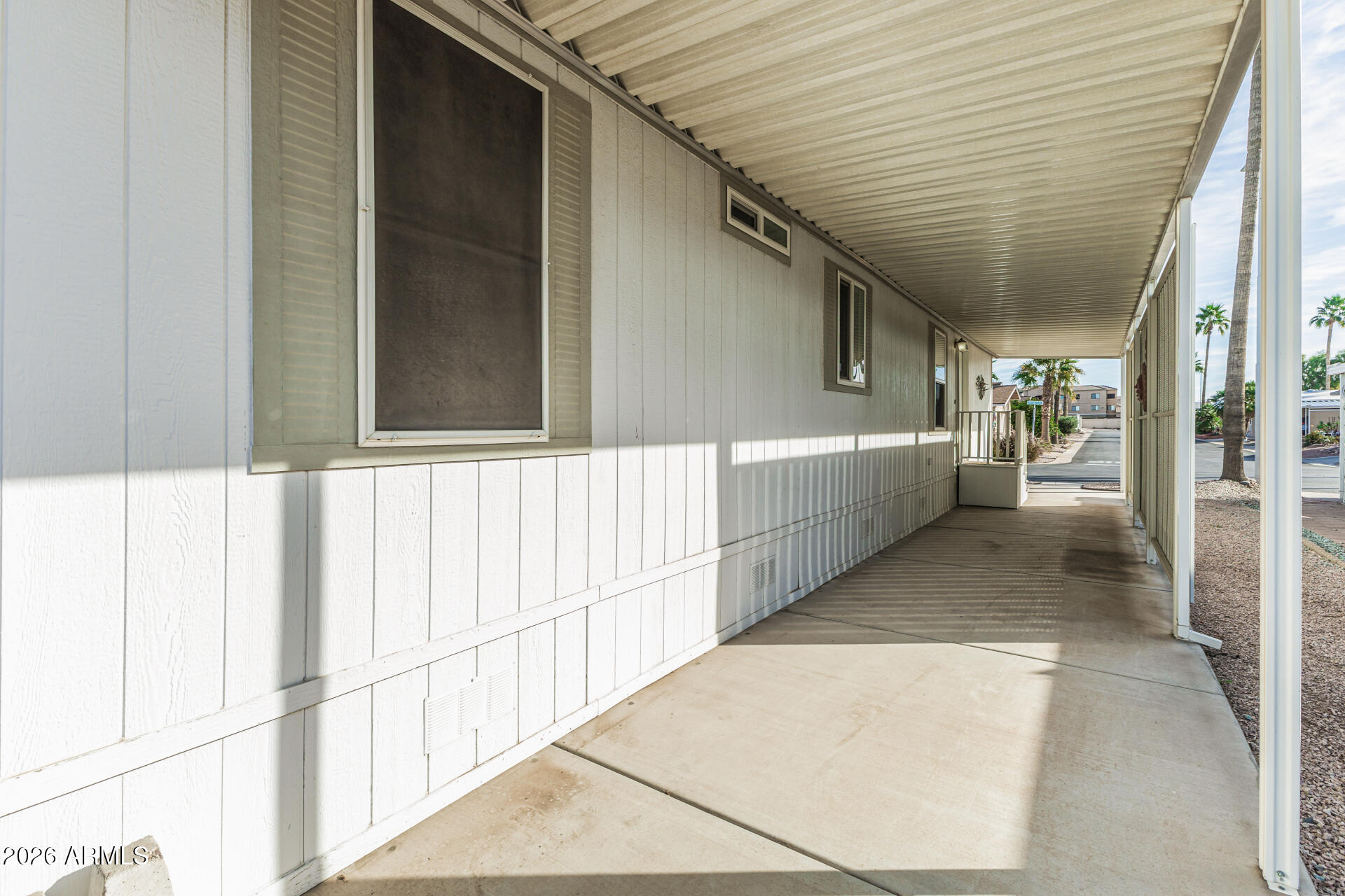 9302 East Broadway Road, Unit 186 Mesa, AZ 85208 - Photo 30 of 40 a view of a porch