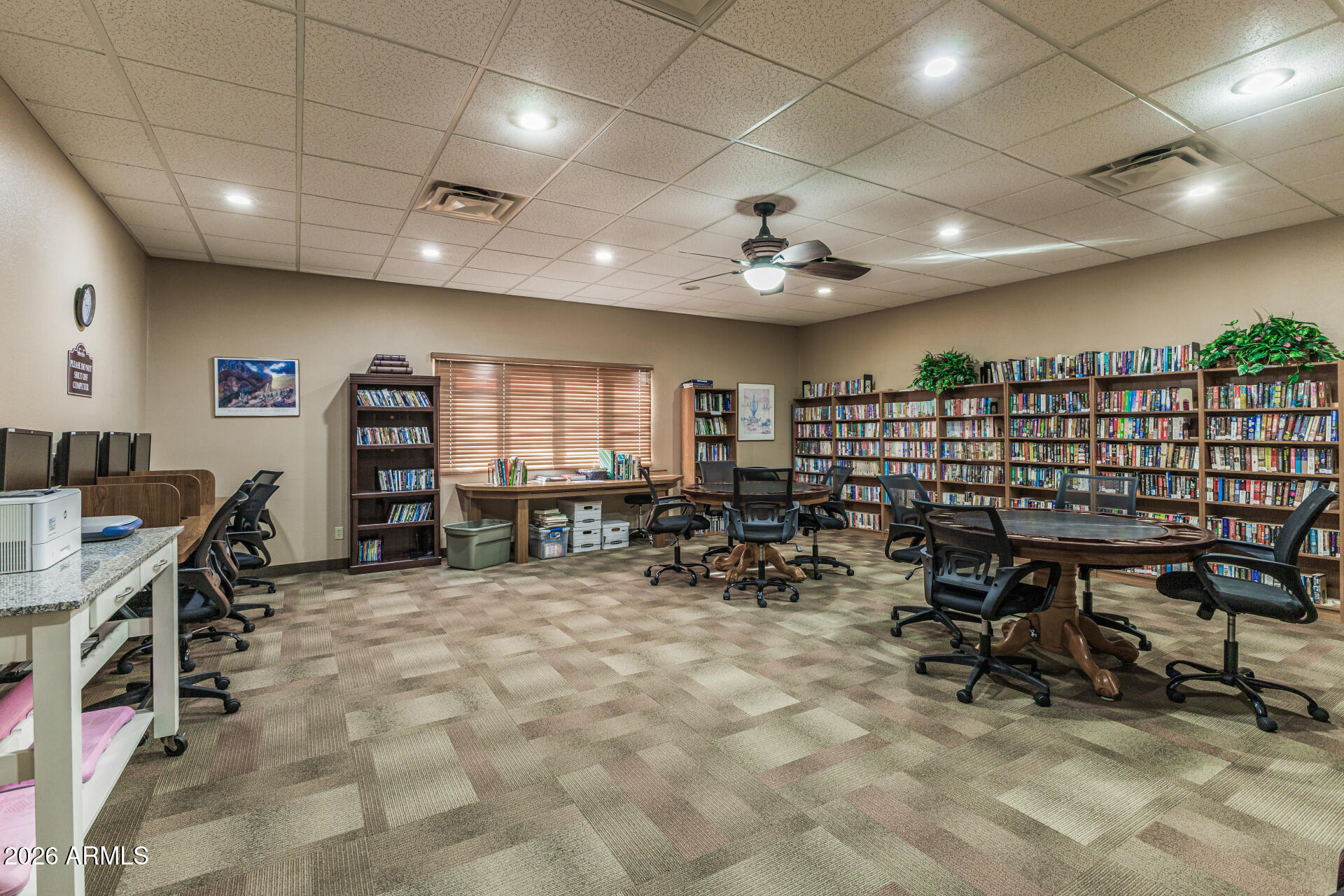 9302 East Broadway Road, Unit 186 Mesa, AZ 85208 - Photo 36 of 40 a view of a room with gym equipment and a large window