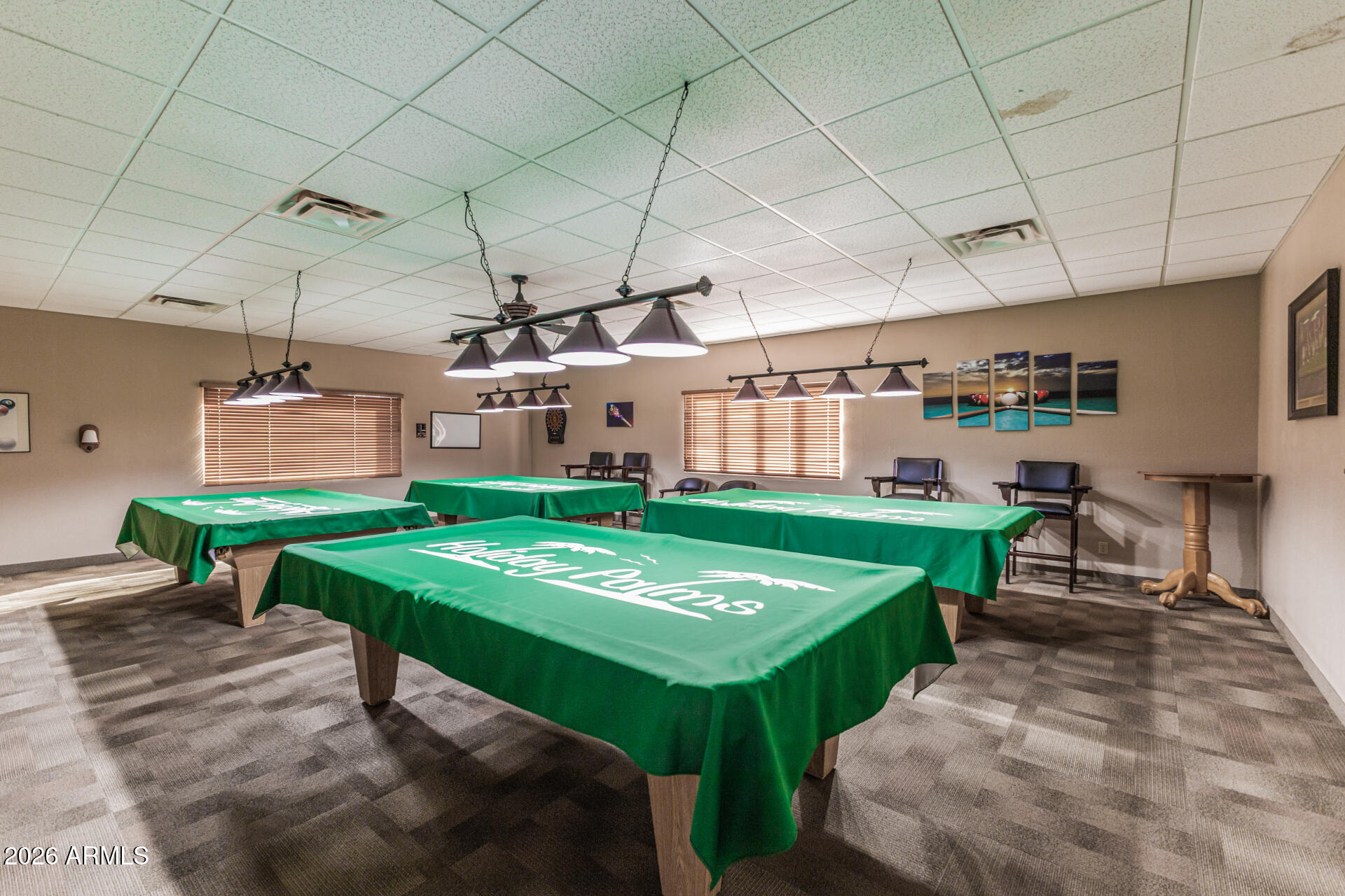 9302 East Broadway Road, Unit 186 Mesa, AZ 85208 - Photo 38 of 40 a room with pool table and chairs