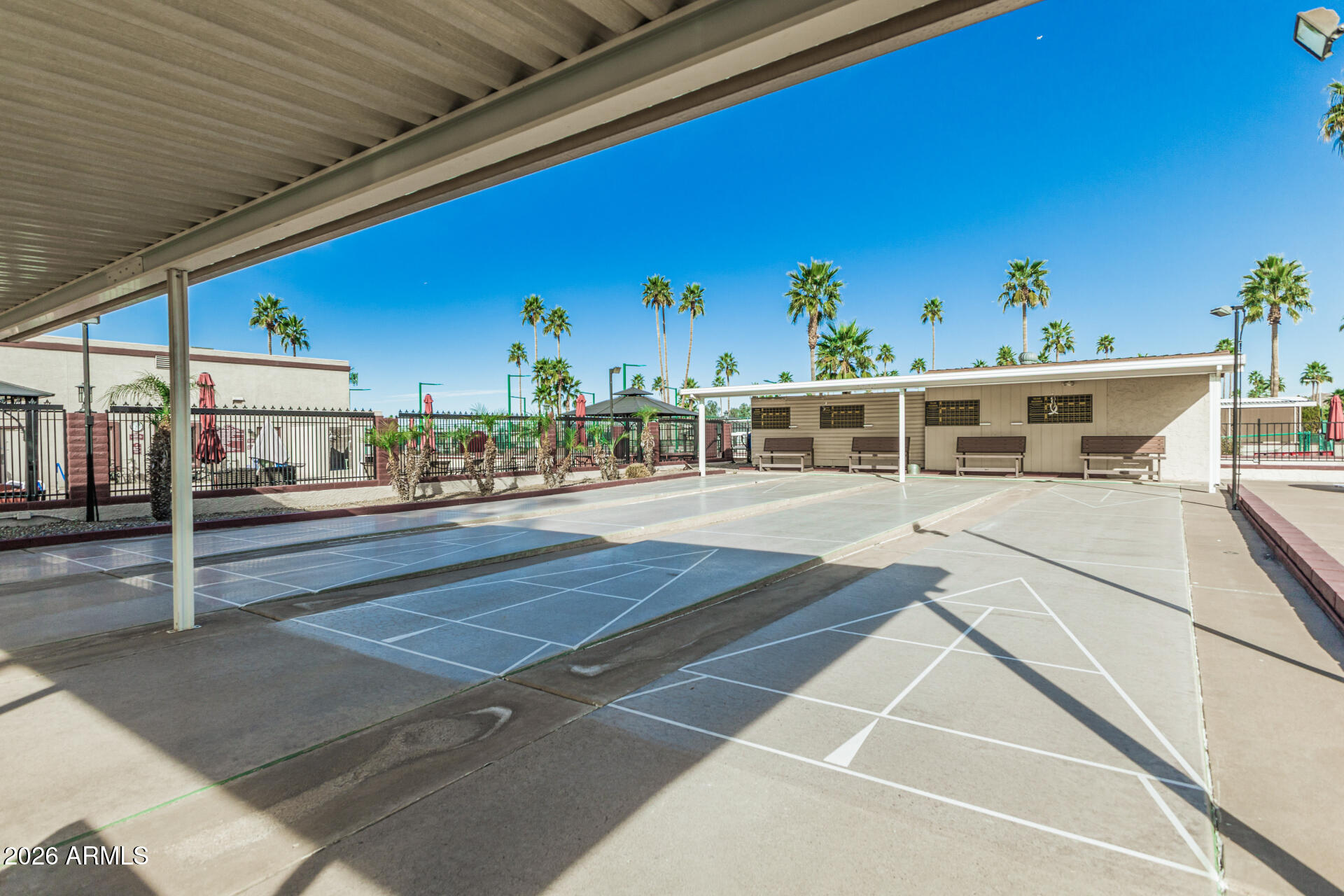 9302 East Broadway Road, Unit 186 Mesa, AZ 85208 - Photo 9 of 40 a view of a balcony with potted plants