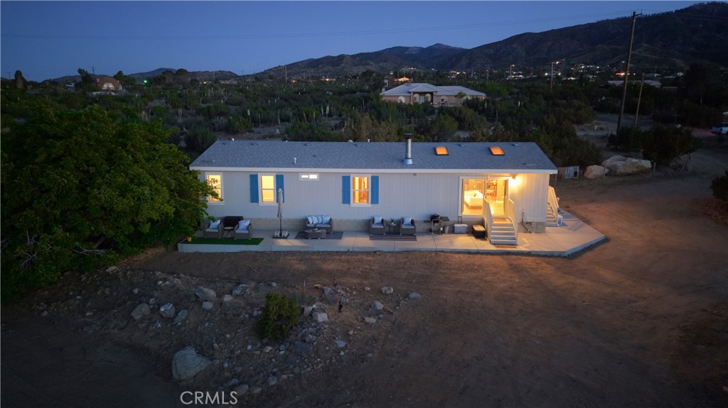 1330 Tamarack Road Pinon Hills, CA 92372 - Photo 3 of 19 a view of a town with barn house in the background