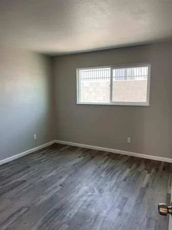 an aerial view of a fireplace with wooden floor