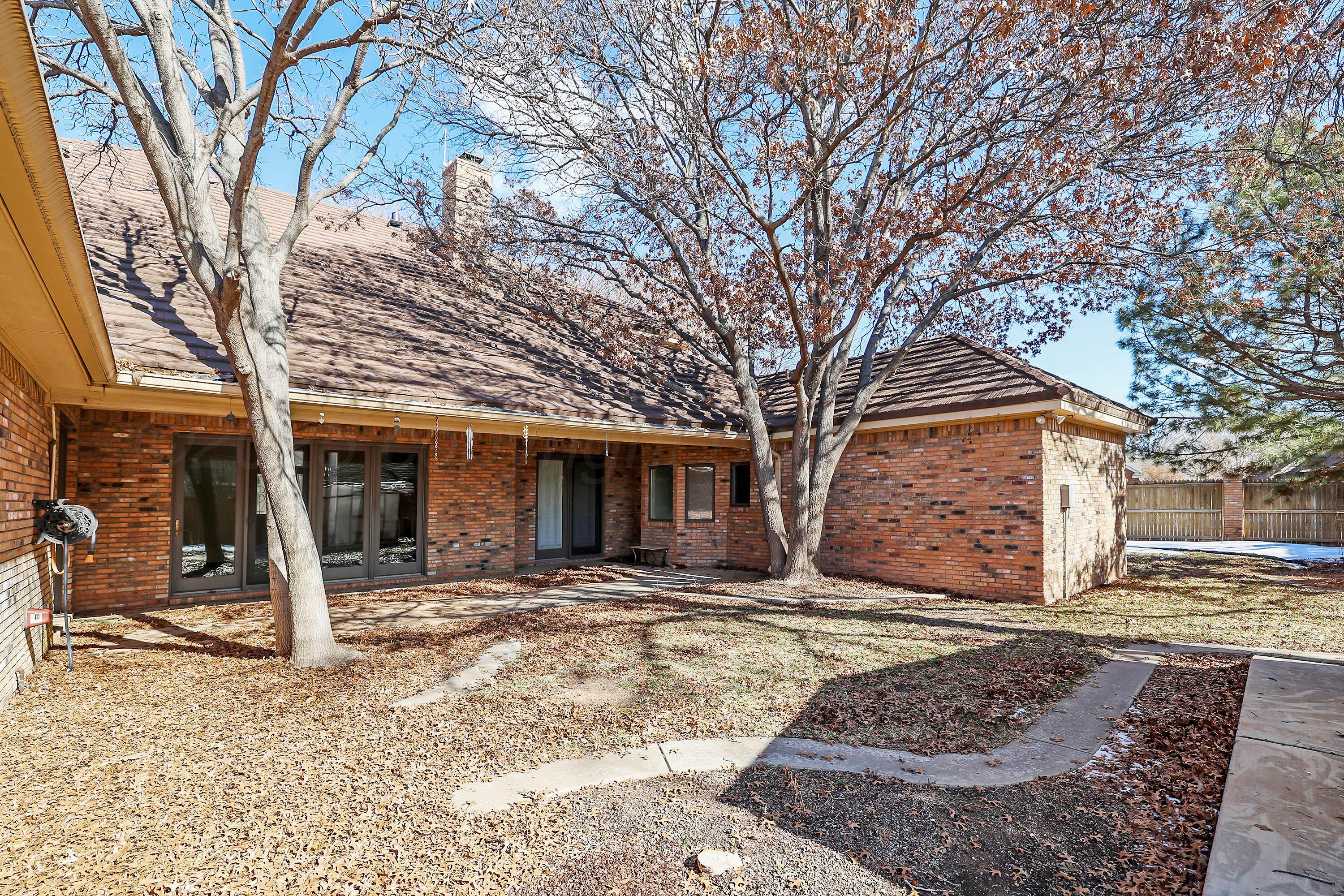 7707 Bent Tree Drive Amarillo, TX 79121 - Photo 45 of 47 a view of a house with snow on the tree