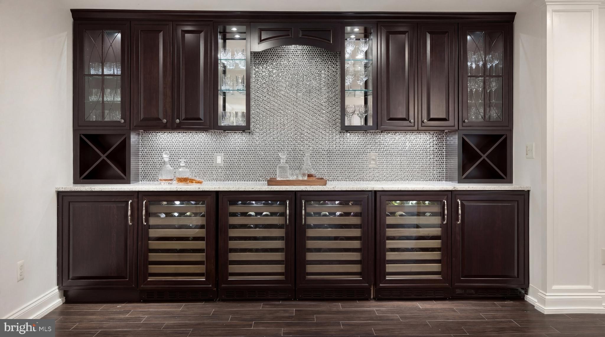 9250 Persimmon Tree Road Potomac, MD 20854 - Photo 42 of 47 a kitchen with a sink and cabinets