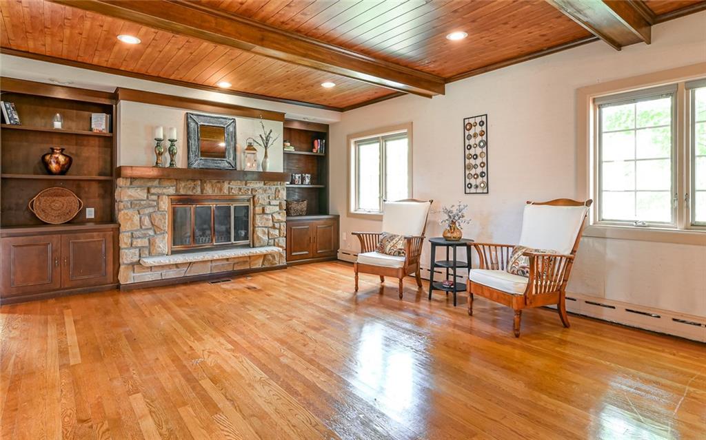 1505 West Ingomar Road Pittsburgh, PA 15237 - Photo 15 of 42 Stone fireplace with built-in bookcases.