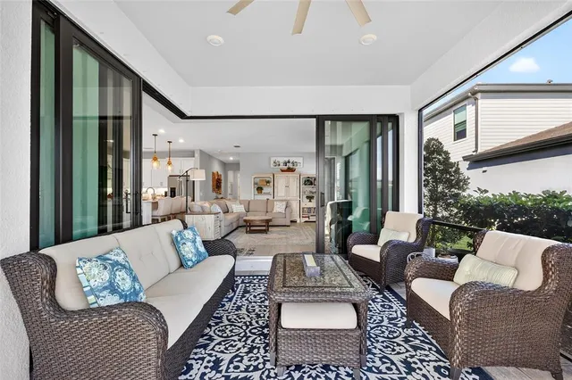 a view of swimming pool with a lounge chair