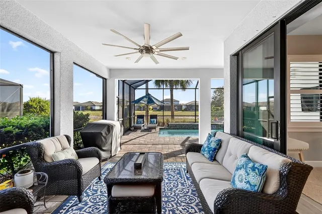 a view of a lake with houses in the background