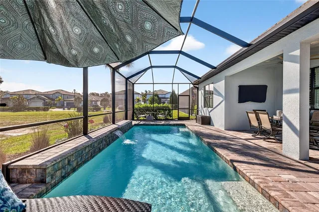 a bathroom with a double vanity sink and mirror