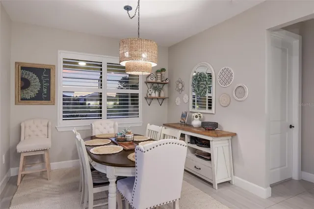 an aerial view of a house with a ocean view